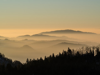 Morning before the sunrise above the low Morning before the sunrise above the low clouds viewed...
