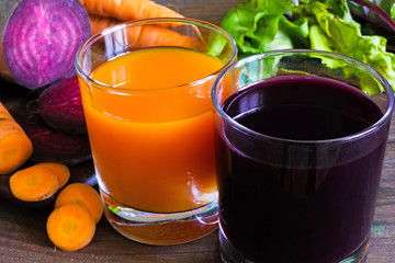 beetroot and carrot juice with fresh sliced vegetables