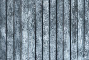 Several of planks. Black and white photo. Fragment of the fence.