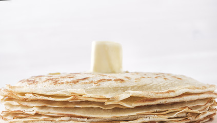 Close-up pancakes with butter