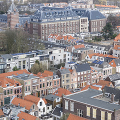 Vintage tiled roofs in the old downtown of Delft, Netherlands in the beginning of spring.