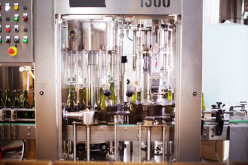 Close-up of bottling machine in the brewery
