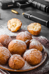 Homemade donuts with sugar and gun