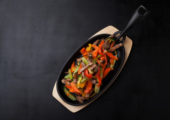 Steamed vegetables with beef and sesame seeds