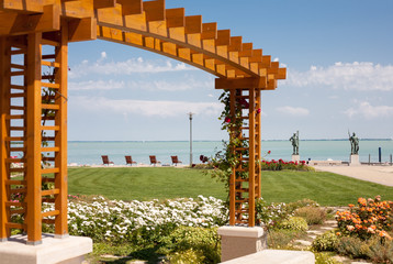 The beach of Lake Balaton with rose trellis