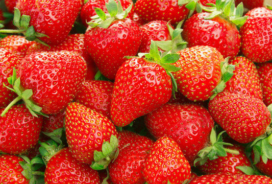 Ripe red strawberries background