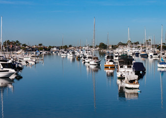 Fototapeta na wymiar Boats in Newport Beach Harbor on a sunny day