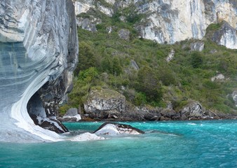 The stunning light blue waters and white marble cliffs near Puerto Rio Tranquilo in Chile.