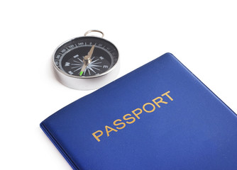 Passport and compass isolated on white background