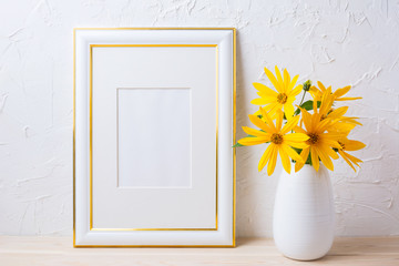 Gold decorated frame mockup with yellow rosinweed flowers
