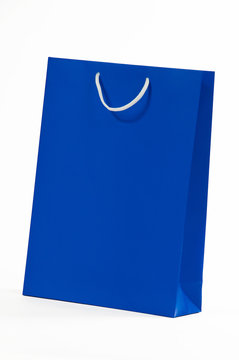 blue paper bag isolated on white background.