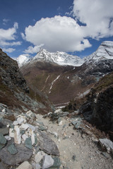 Obraz premium Mountain trail in Yading-China. Path along the ridge leading to summit