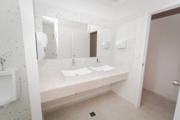 Naklejka na ściany i meble Amazing gorgeous beautiful view of modern stylish bathroom with big wide mirror on the wall 