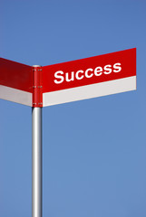 road signpost with success text