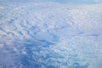 white fluffy clouds in the blue sky