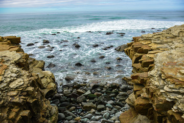 Rock shoreline in a calm sea