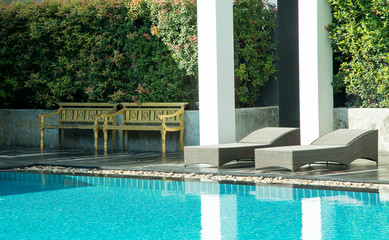 sun-bed near a swimming pool