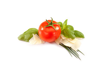 Tomato, basil, cheese and green onions on white