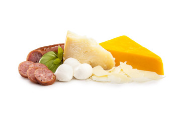Mixed cheeses, sausage and basil on white