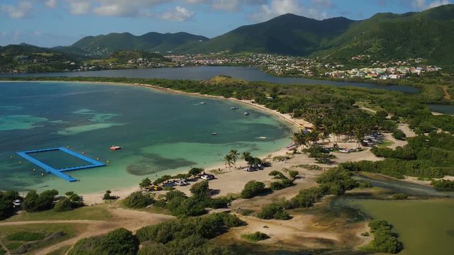 St Maartin Aerial v51 Flying over Le Galion Beach panning down.