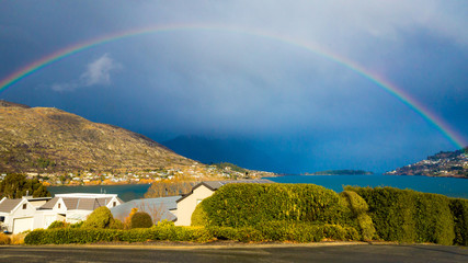 A rainbow over Lake Wakatipu in Queenstown, New Zealand