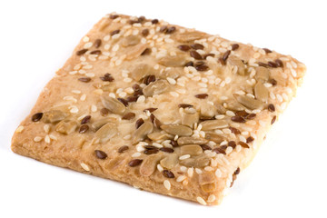 crispy bread with seeds of sunflower, flax and sesame seeds Isolated on white background