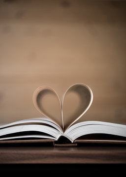 Pages of a book forming the shape of the heart. Love concept.
