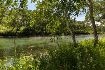 Khodutkinskiye hot springs at the foot of volcano Priemysh. South Kamchatka Nature Park.