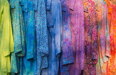 A rainbow of batik clothing - obrazy, fototapety, plakaty