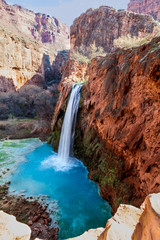 Havasu Falls is located in the Village of Supai on the Havasupai Reservation in the Grand Canyon, AZ