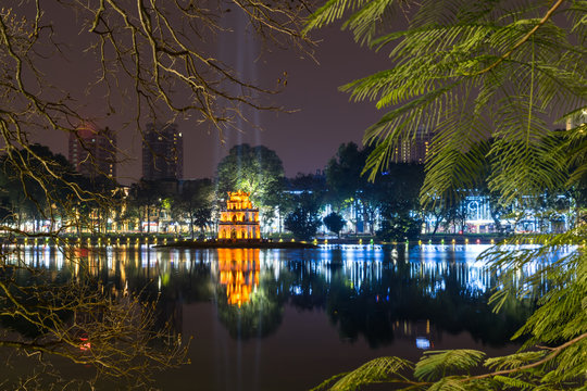 Night view of the Hoan Kiem Lake and the Turtle Tower in Hanoi
