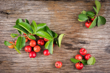Acerola cherry on wood(Malpighia emarginata)
