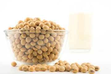 Soy beans with soy milk on white background