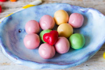 Candy in a ceramic plate handmade