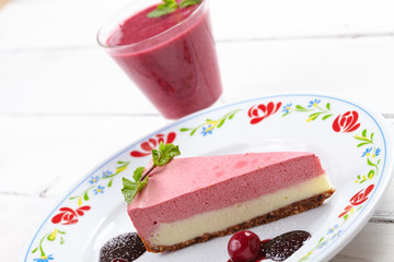 tasty cheesecake with smoothie