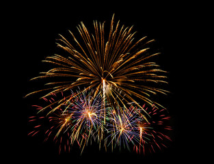 Obraz premium Colorful fireworks of various colors over night sky - Vibrant color effect