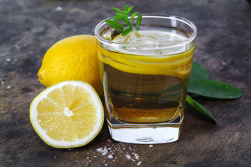 fresh lemon whole and slice with lemon leaf