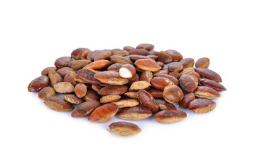 pile of Barking deer's mango or Wild almond seed on white background