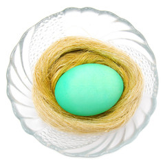 Colorful easter egg isolated in bowl