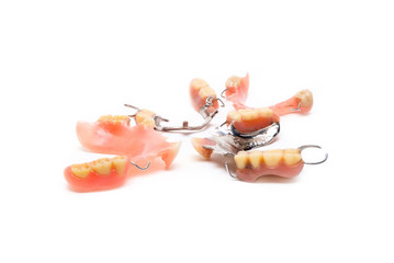 old man real denture with plastic type and stainless steal type.