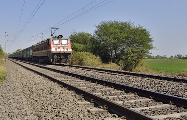 Fototapeta na wymiar Indian Long Distance Train Approaching Station