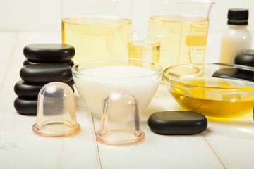 hot black massaging stones on mat