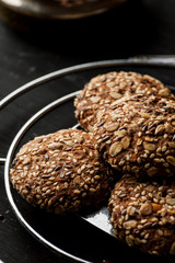 Oatmeal cookies on a metal stand, vertical