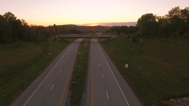 US Countryside Aerial v1 Flying low over Vermont 279 towards Bennington VT at sunset.