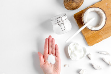 organic cosmetics with coconut on white background top view mockup