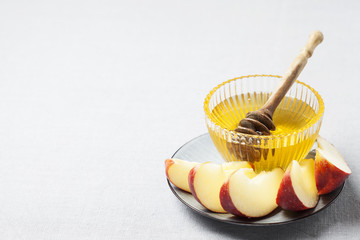 Rosh hashanah (jewish holiday) concept: honey, apple and pomegranate