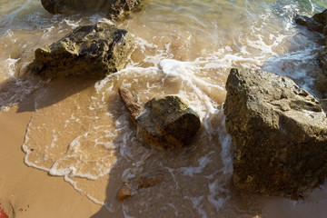 rocks on a sandy beach. Thailand 2017