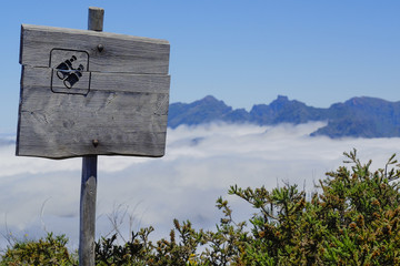 wooden sign on a viewpoint