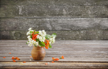  spring flowers on wooden background