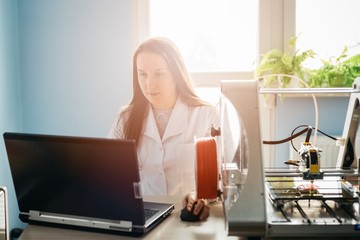 Woman designing prototype for 3d printing